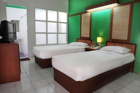 Image And Resto Hotel *